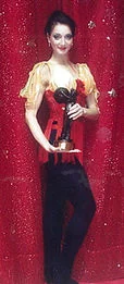Andreea on stage holding the Bronze Clown trophy