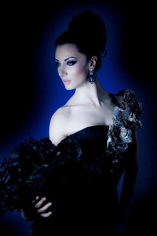 Andreea Mateescu in blue stage light